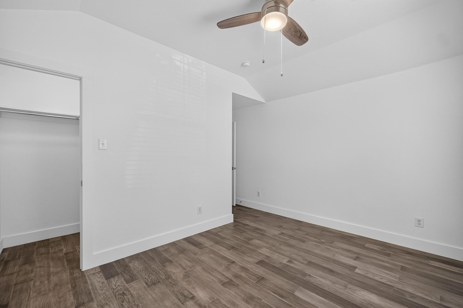 Bedroom with walk in closet